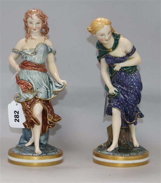 A pair of Royal Worcester figures after James Hadley, Before the Wind and After the Wind, H 28.5cm (tallest)